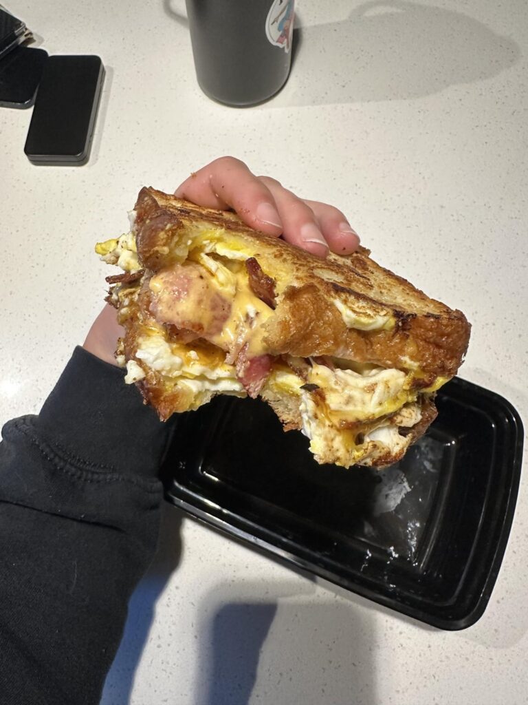 bacon egg and cheese on croissant bread