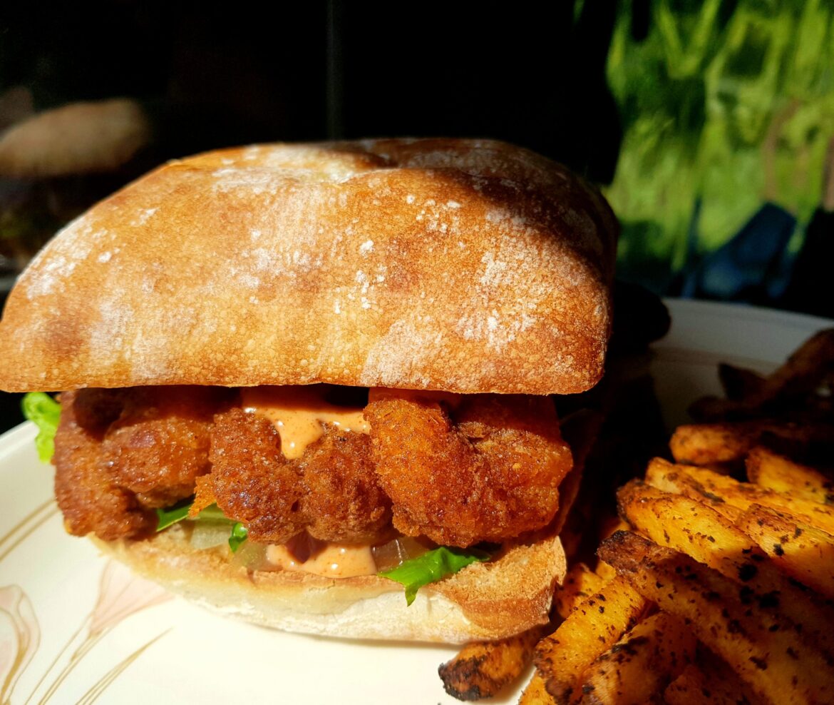 Cajun Prawns with Spicy Mayo in Ciabatta & Old Bay Fries.