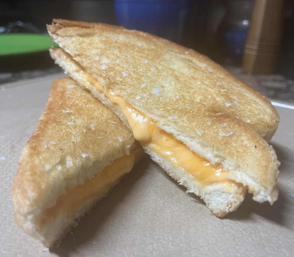 Thick cut French bread with American and cheddar cheese. Perfection.