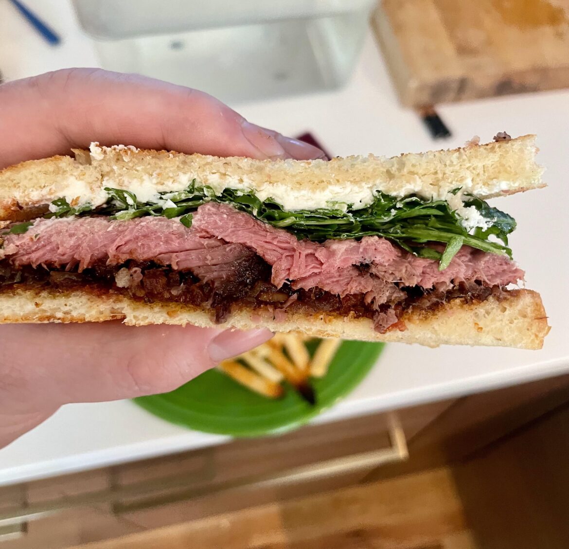 Sous Vide Steak, Coffee Jalapeño Bacon Jam, Goat Cheese, and Arugula.