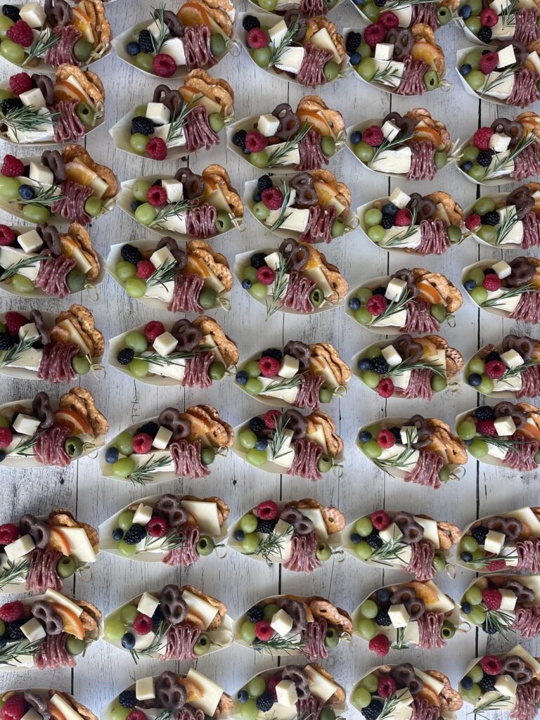 Made  these little charcuterie boats to help a program celebrate their volunteers .