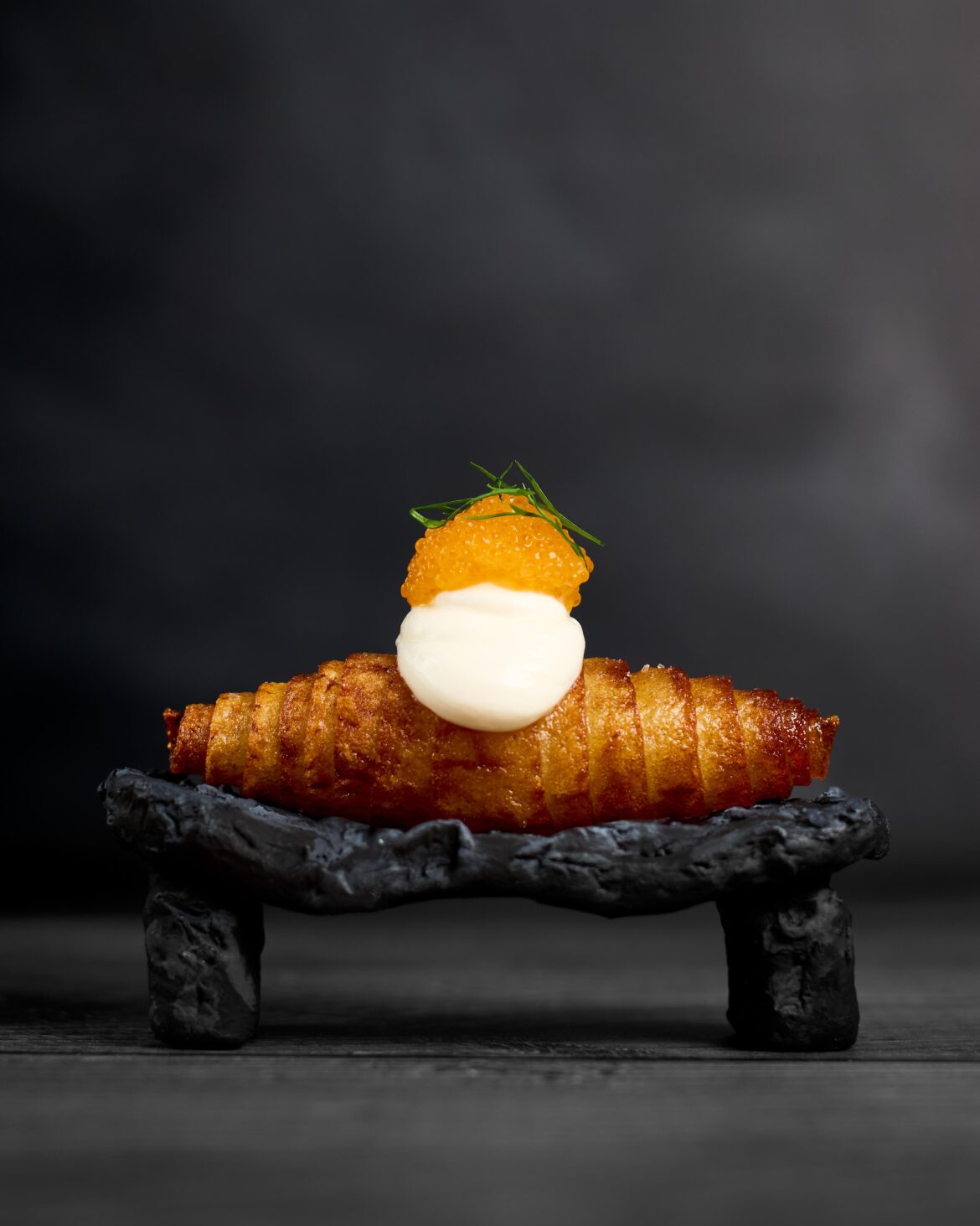 Amuse bouche: Deep fried potato, smoked crème fraiche and Swedish roe