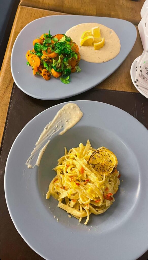 Lemon and pepper pasta and a salad of roasted carrots and broccoli with tahin sauce, opinions