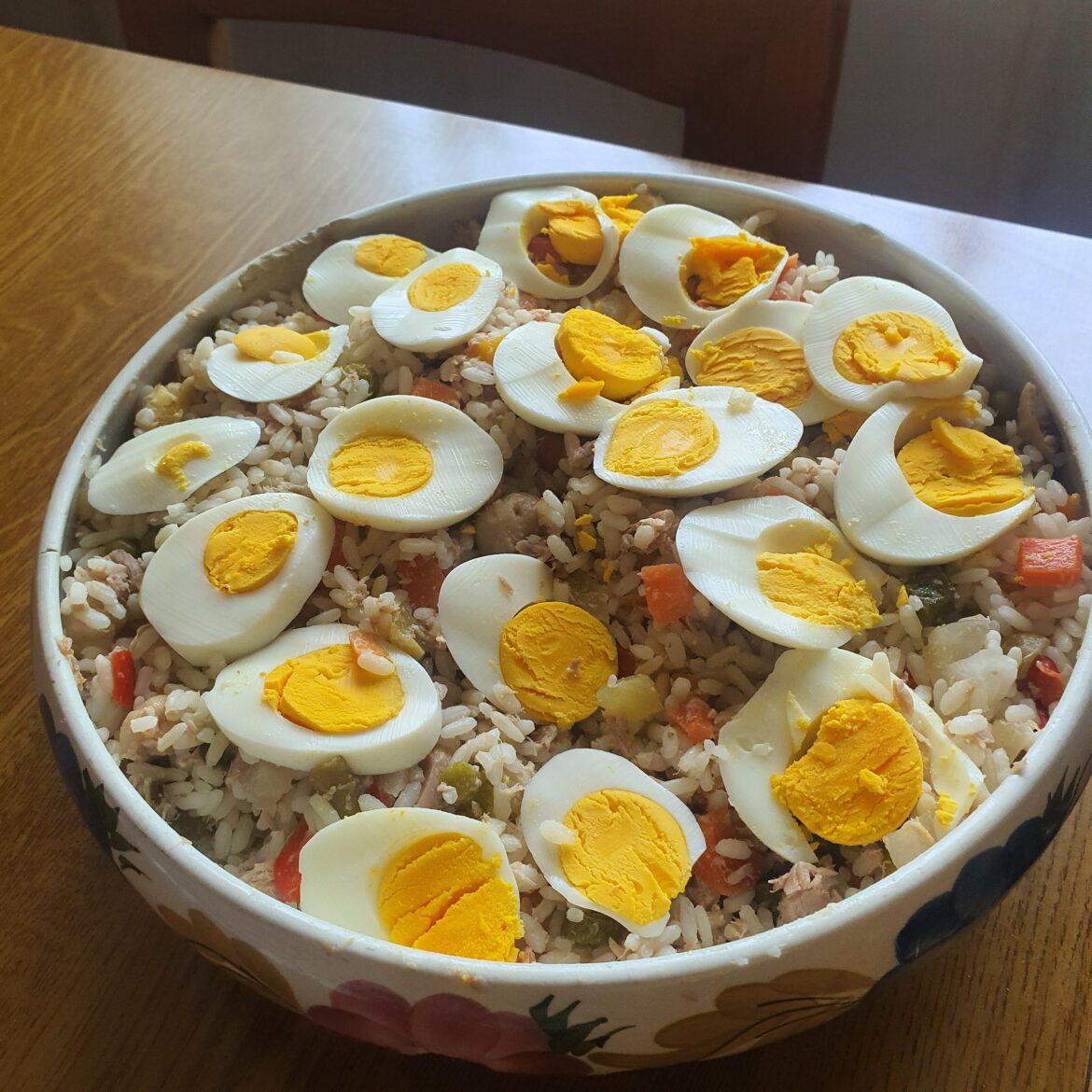 Rice salad....boiled rice, vegetables, tuna, cheese, eggs.