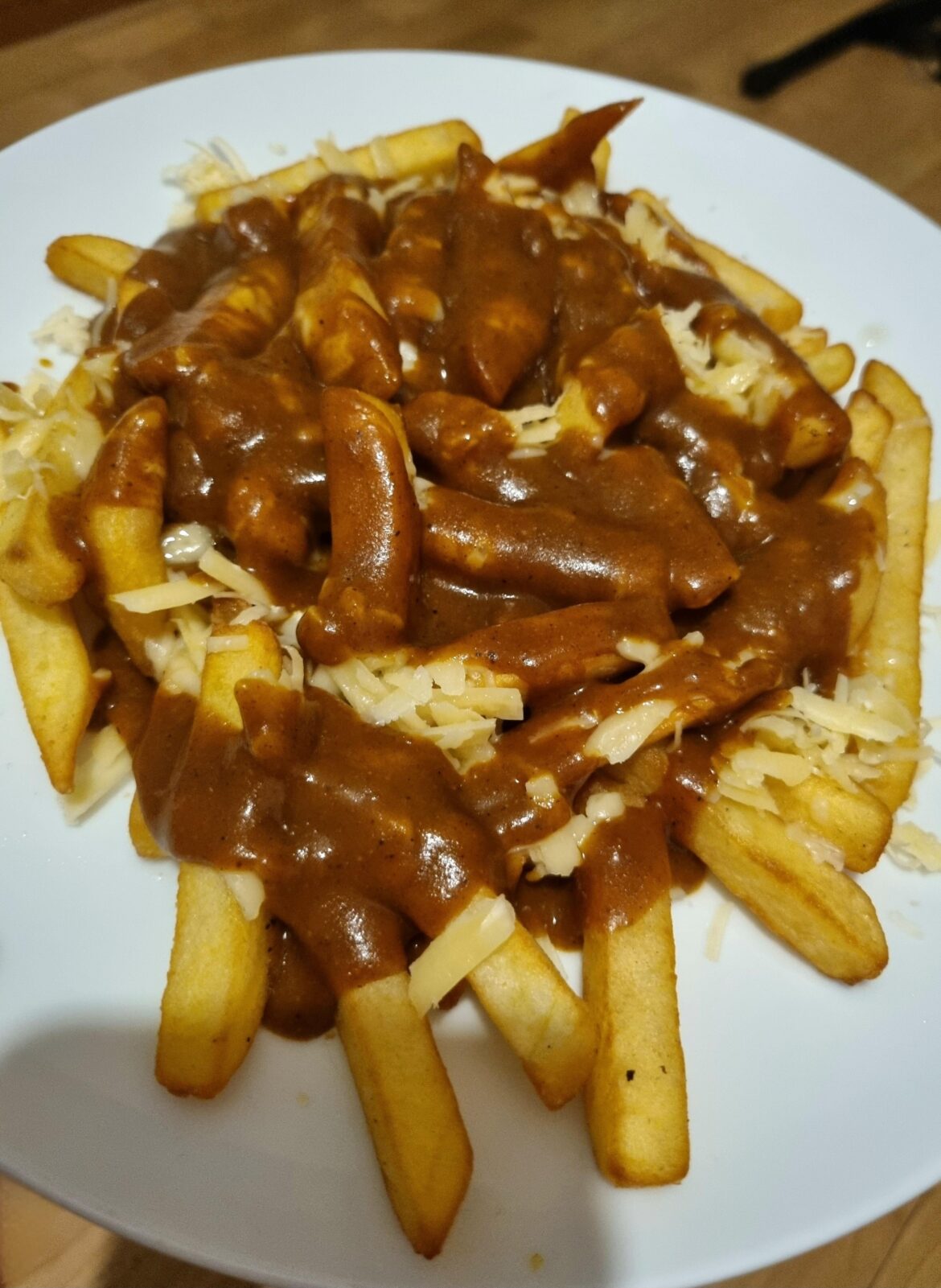 Homemade chippy tea. Chips, cheese and curry