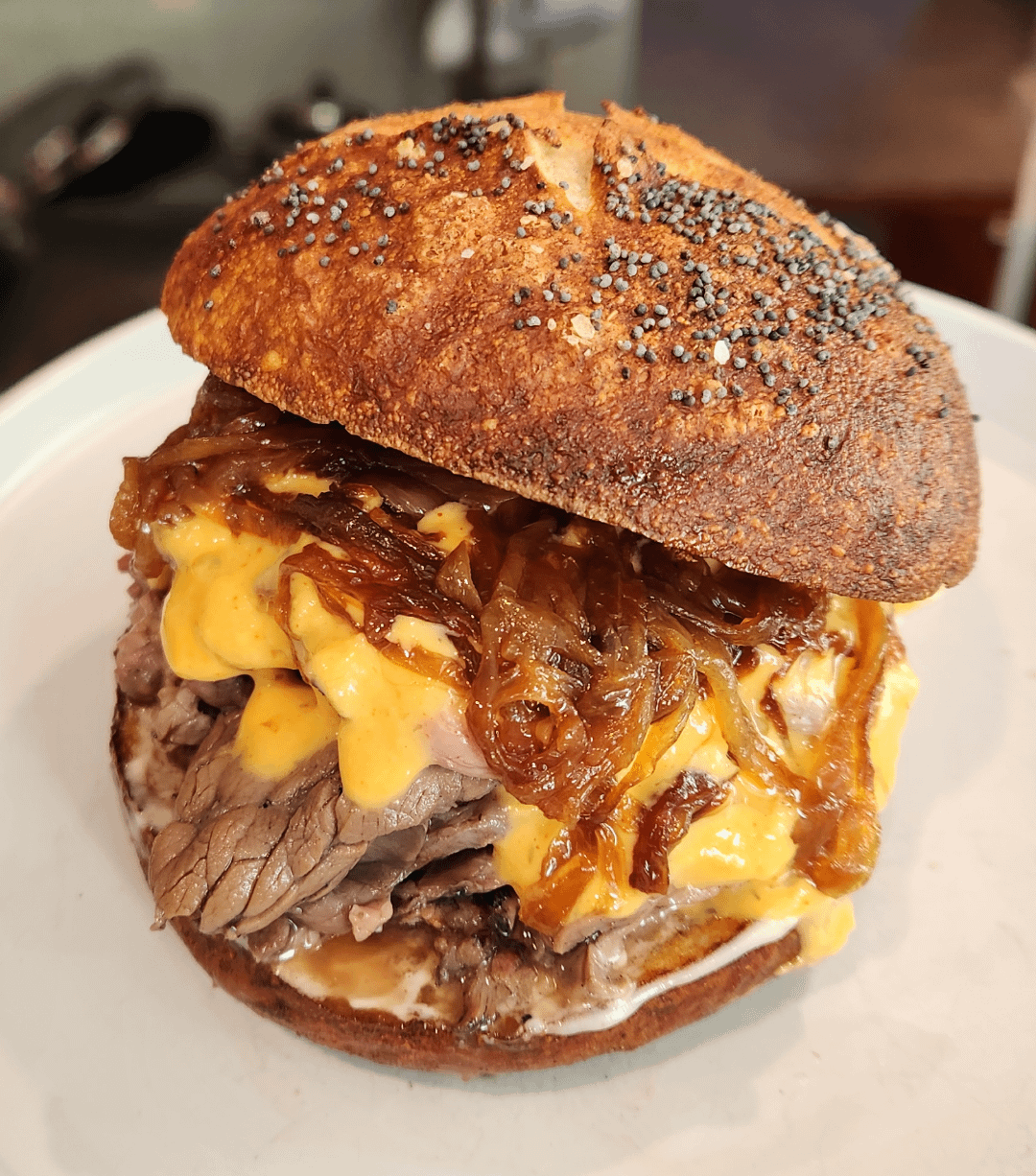 From scratch smoked roast beef, horseradish beer cheese, caramelized