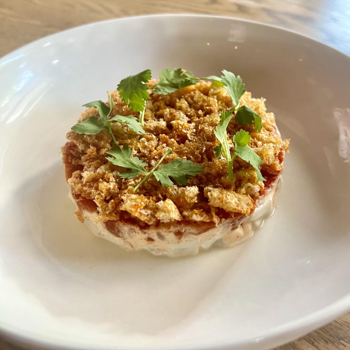 Pickerel ceviche, smoked paprika, tomato, chicharron, cilantro