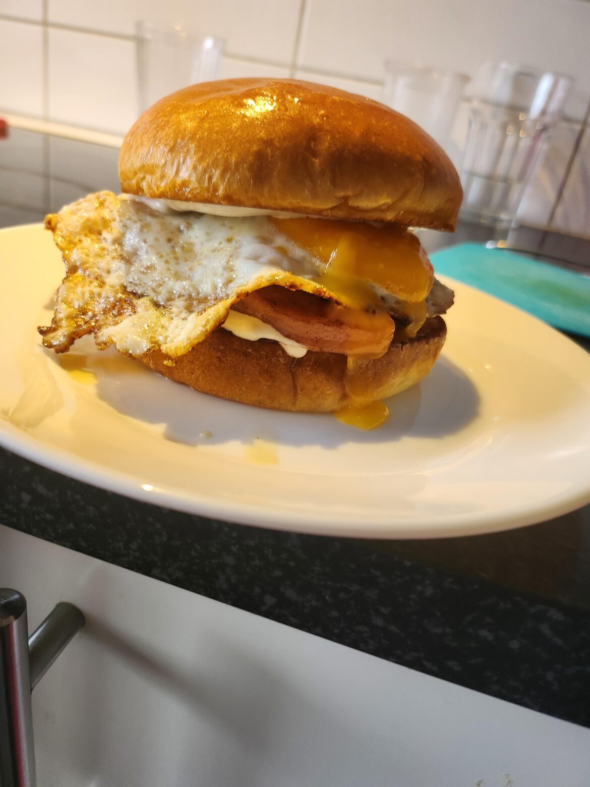 Fried brioche, slow fry bologna, aioli and a runny egg...