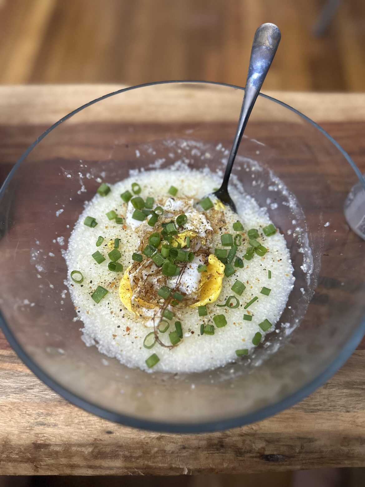 Late night grits with an egg and green onions