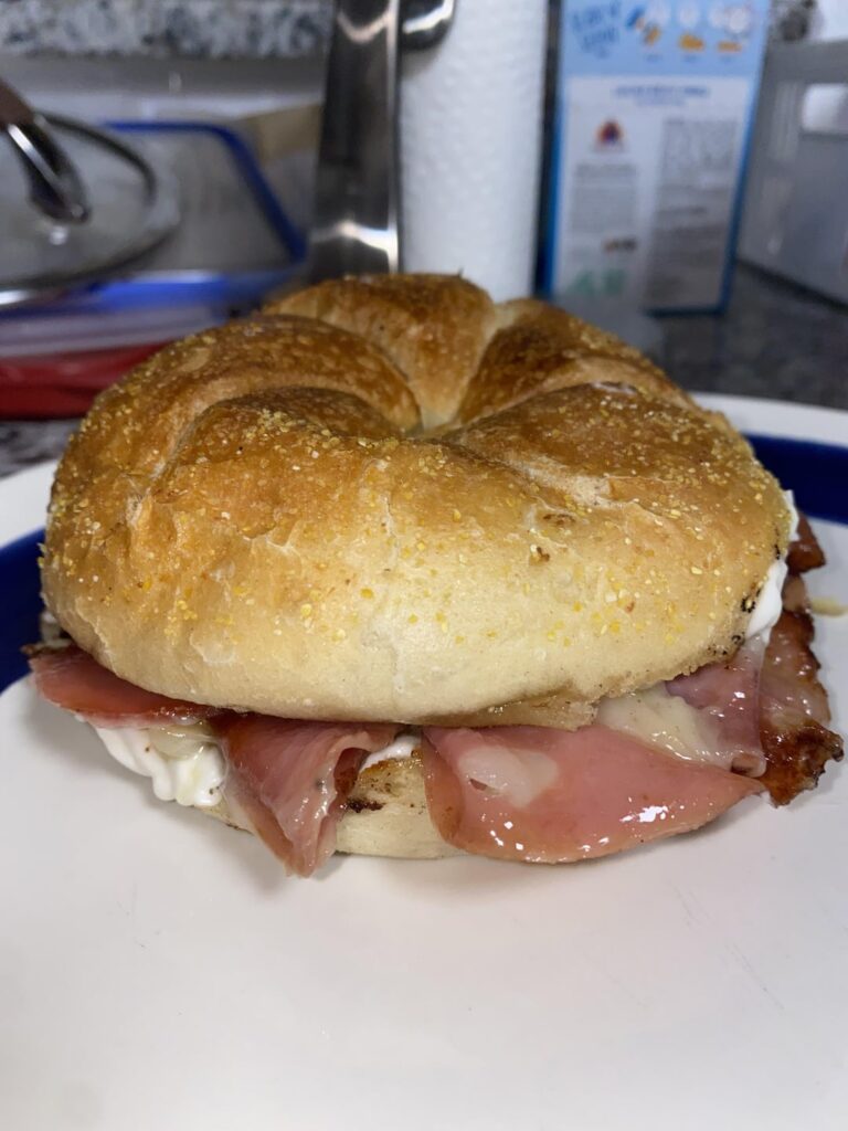 Got drunk & stoned so I made the gf and I Anthony Bourdains favorite sandwich: Mortadella, Provolone, Dijon, Mayo, on a Toasted soft Kaiser Roll