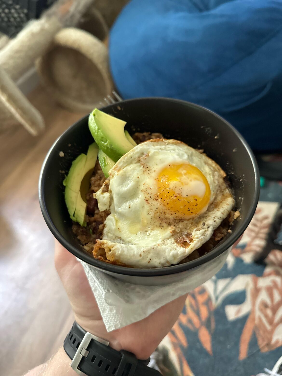 One of the weirdest but delicious combos, ribeye steak red beans and rice with a fried egg and sliced avocado.