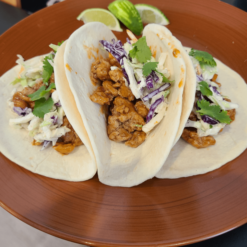Sweet and spicy cashew pork tacos - best meal I've gotten in a while