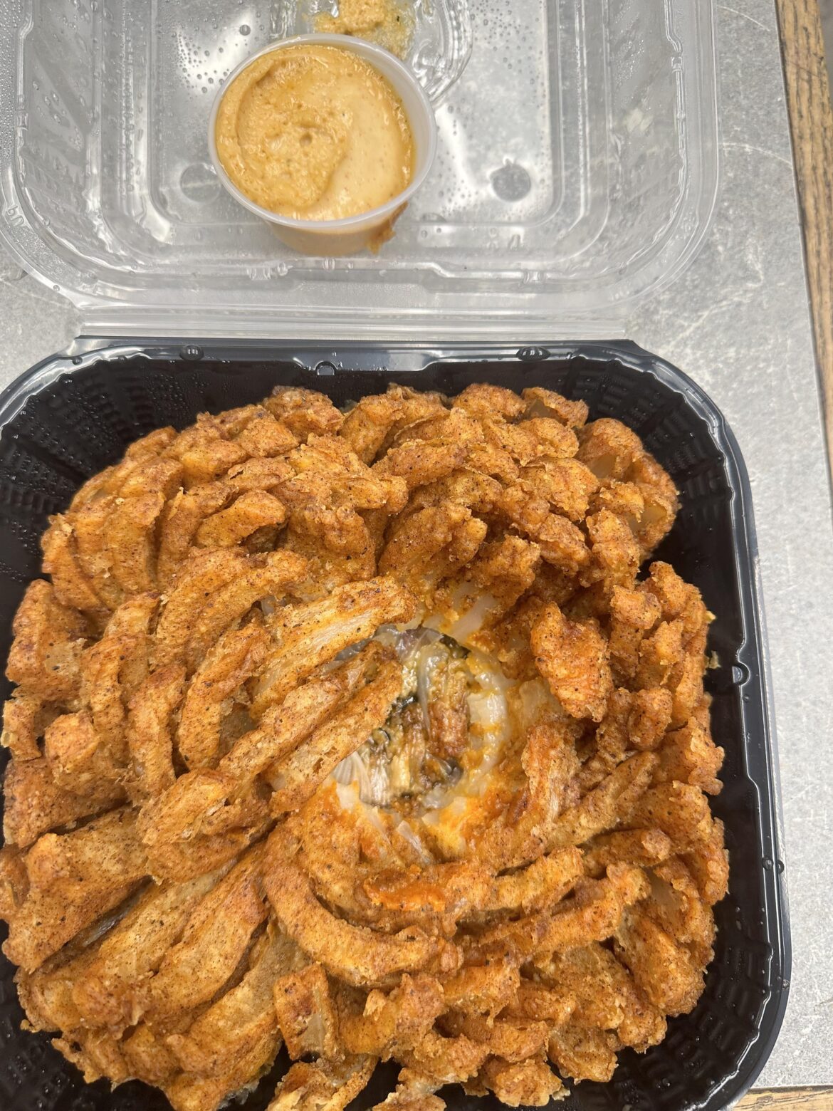 Ok guys I did it again, I had a bloomin onion delivered to work and this time I remembered to snap my own pic before I ate it.