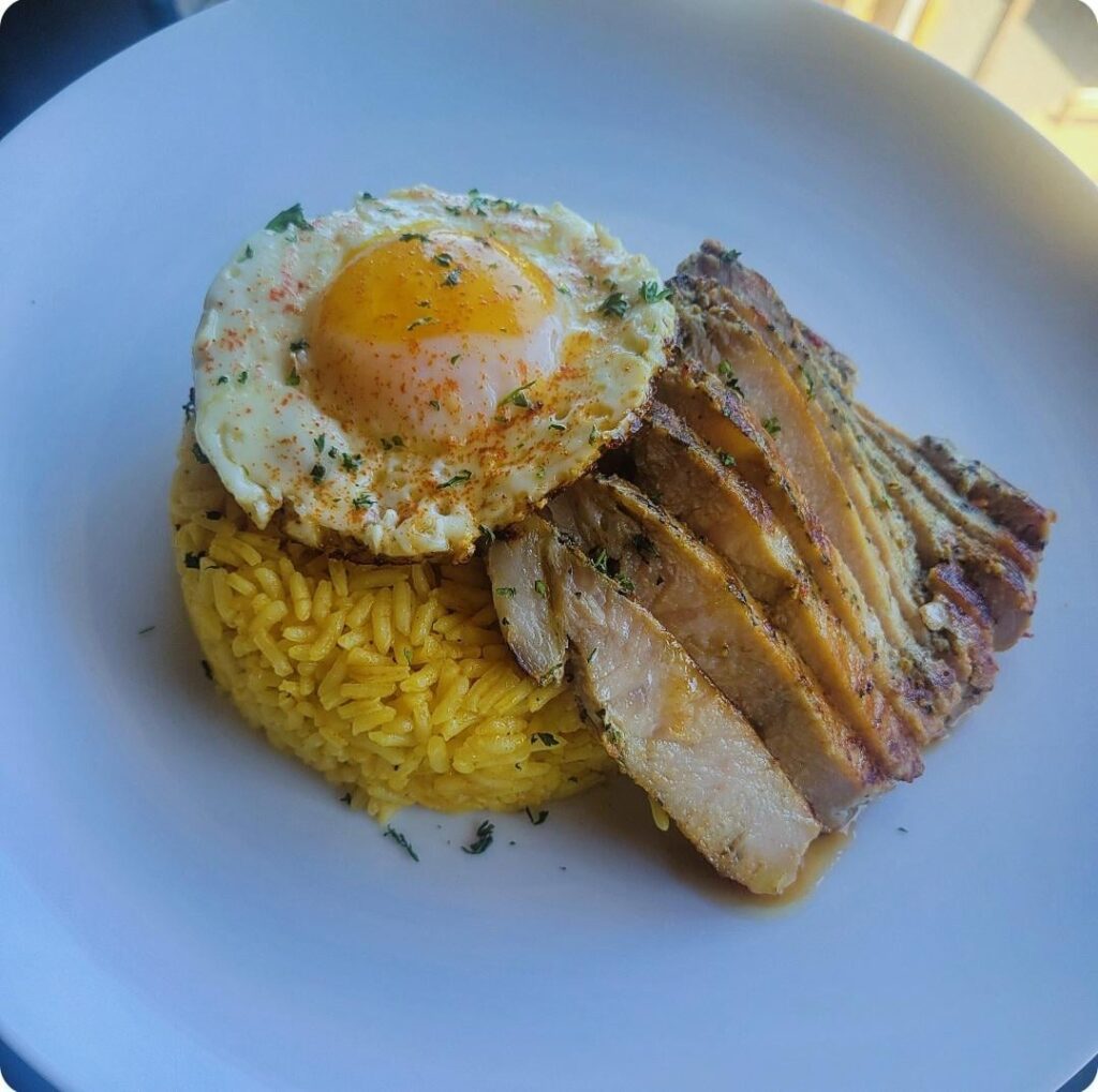Marinated Pork Chop with spiced rice and sunny side up egg. *details below.