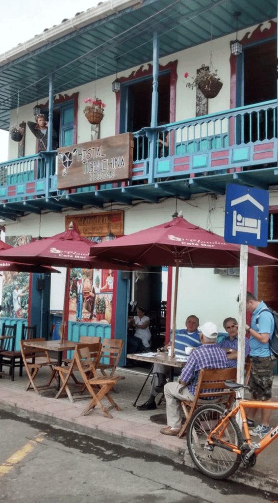 The charm of Colombia and its coffee shops, drinking coffee outdoors is very delicious.