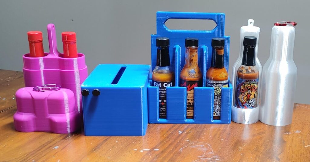 My 3D Printed Hot Sauce Carriers I created