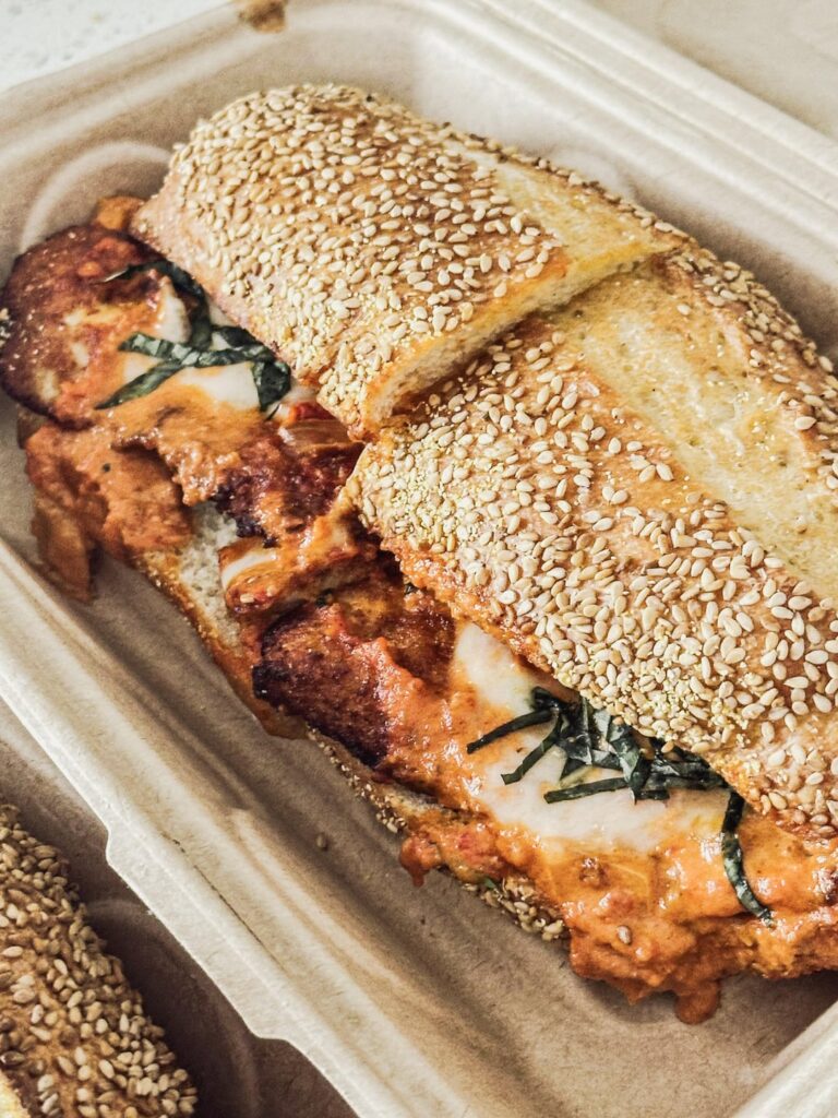 Small local pizzeria is doing $10 hoagies on Mondays. Was torn between Vodka Parm and Honey Buffalo… so naturally had to get both