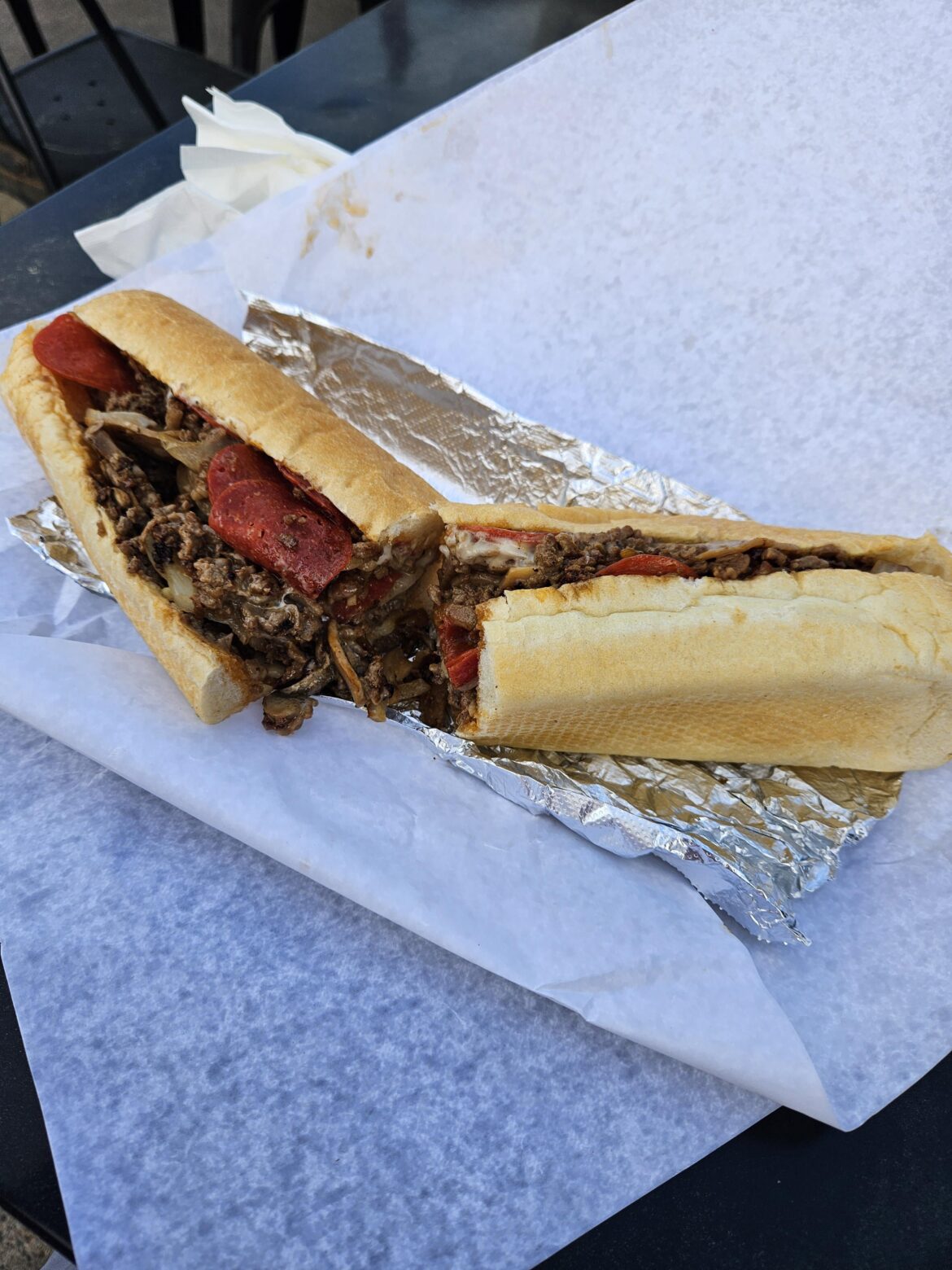 Steak & Cheese, pepperoni, sausage, mushrooms, onions, peppers, teriyaki sauce from Carl's Steak Sandwiches, Waltham MA