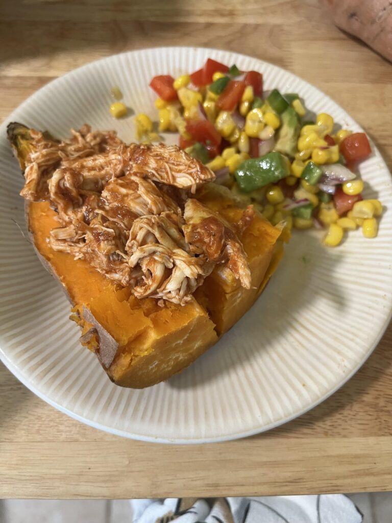 Unfancy, uncomplicated meal for a very tired brain: enchilada chicken stuffed sweet potatoes