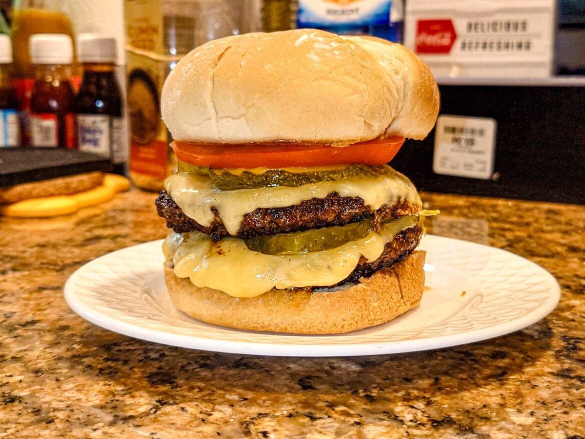 Double burg with right amount of pickles on loven fresh artisanal toasted bun