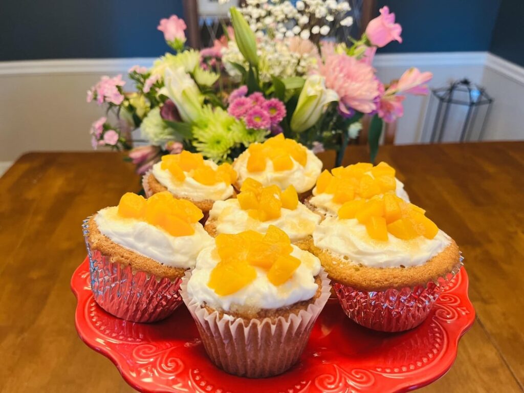 How do you guys feel about spicy and sweet? I have a buddy that makes pepper jellies and jams. He gave me a can of peach habanero preserves that go great with hot honey and peach cupcakes.