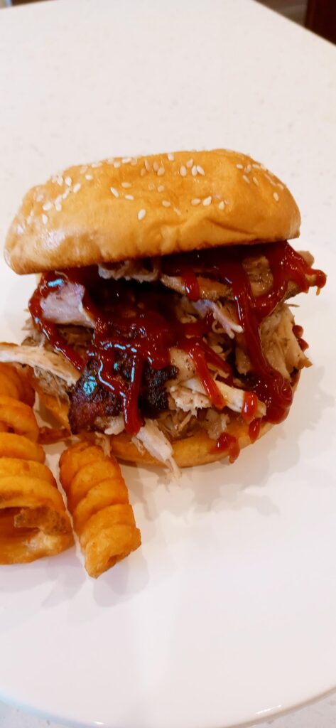 Slow Cooked Pulled Pork With Homemade BBQ Sauce. Are you team coleslaw or just plan with BBQ sauce?