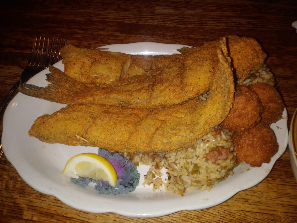 3 whole fried catfish, hush puppies, and double dirty rice; at local Baton Rouge Restaurant named Parrain's Seafood Restaurant on Perkins Road in Louisiana (OC)