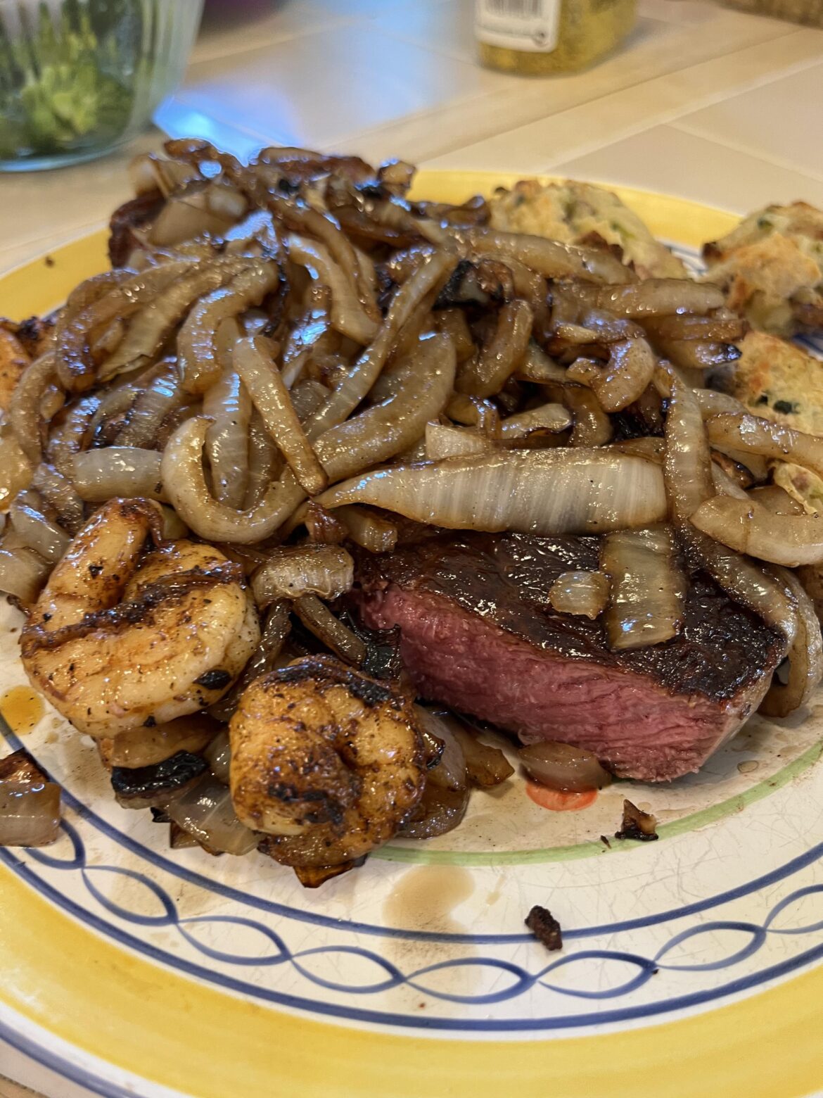 Back with onions side of steak and shrimp