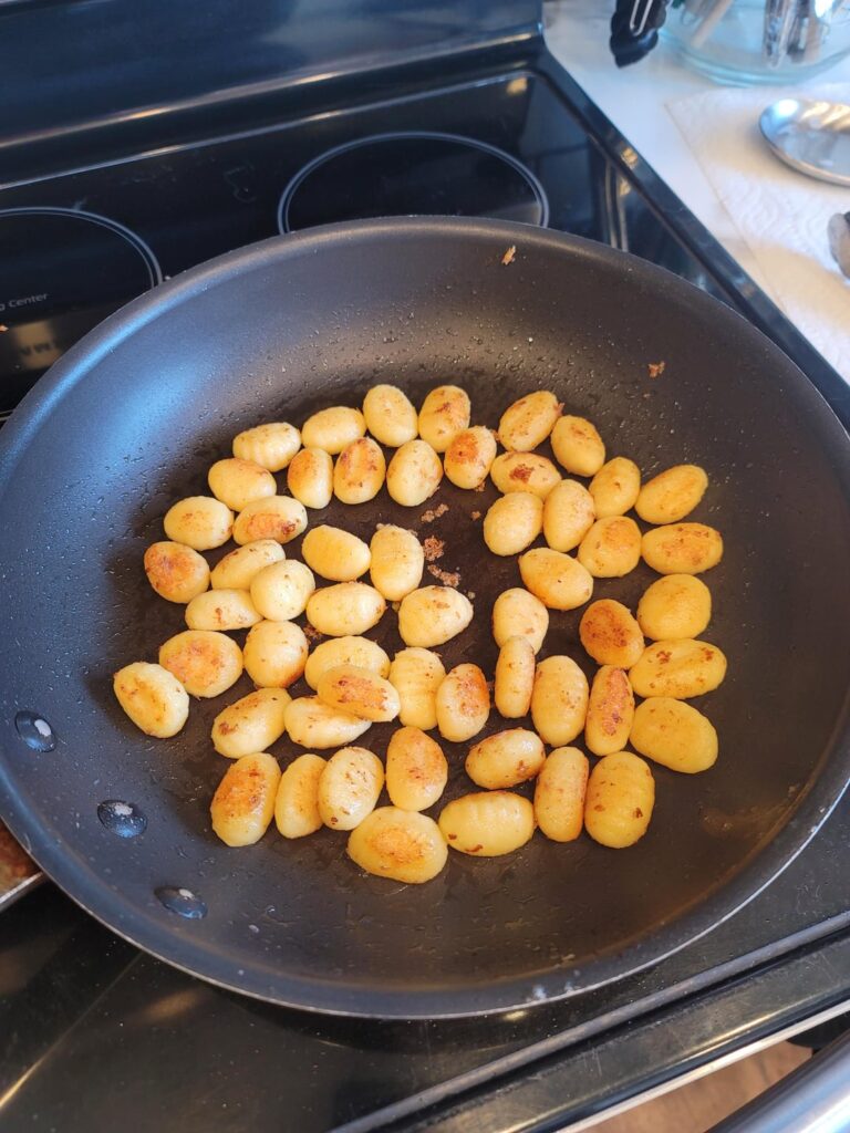 Gnocchi with peas, zucchini and parmesan