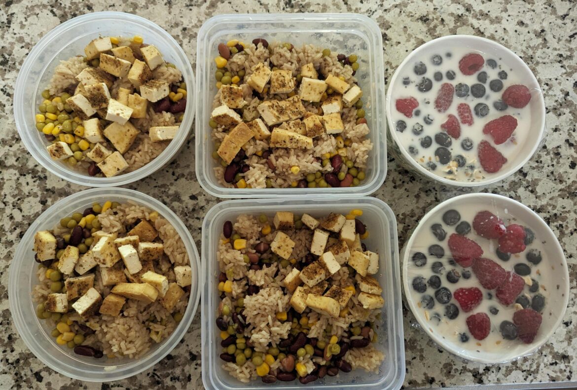 Lunches: Jasmine rice, tri-colored beans, peas and sweet corn, topped with baked tuscan tofu. Breakfasts: Overnight oats in almond milk, topped with fresh blueberries, raspberries and a tri-seed mix.