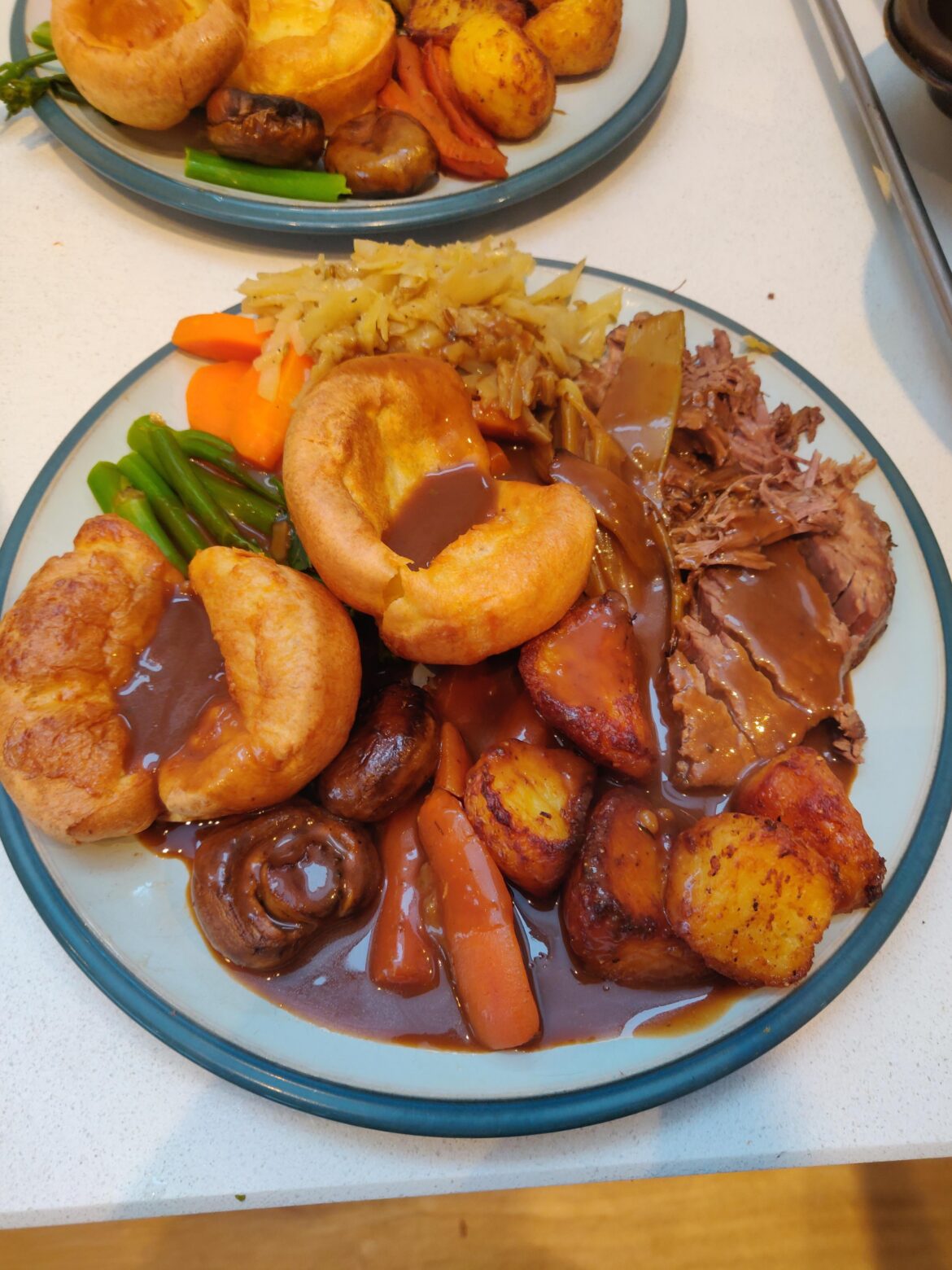 Slow cooked beef brisket roast dinner