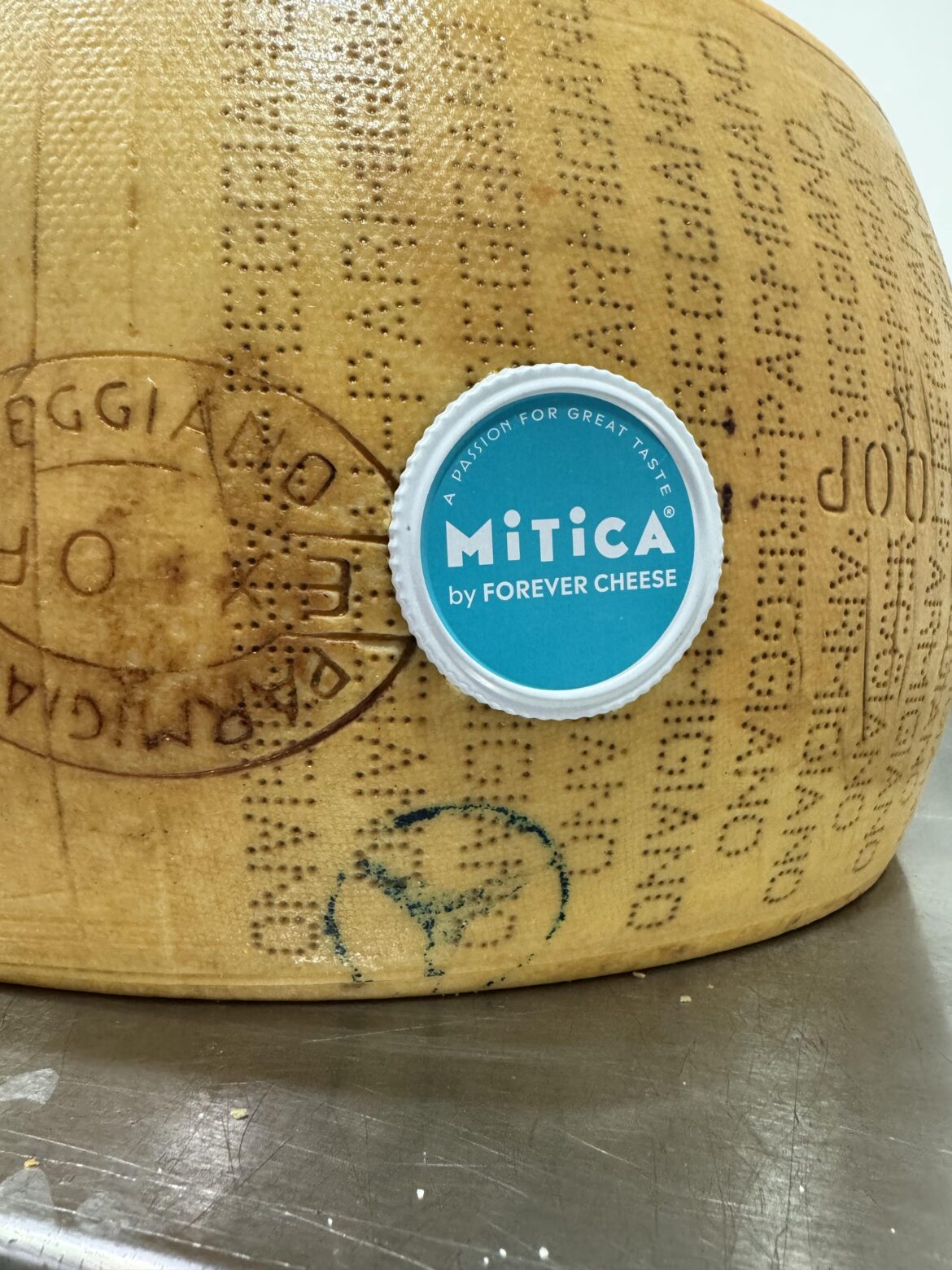 What is this tri-star logo on Parm Regg? What is this tri-star logo on Parm Regg?