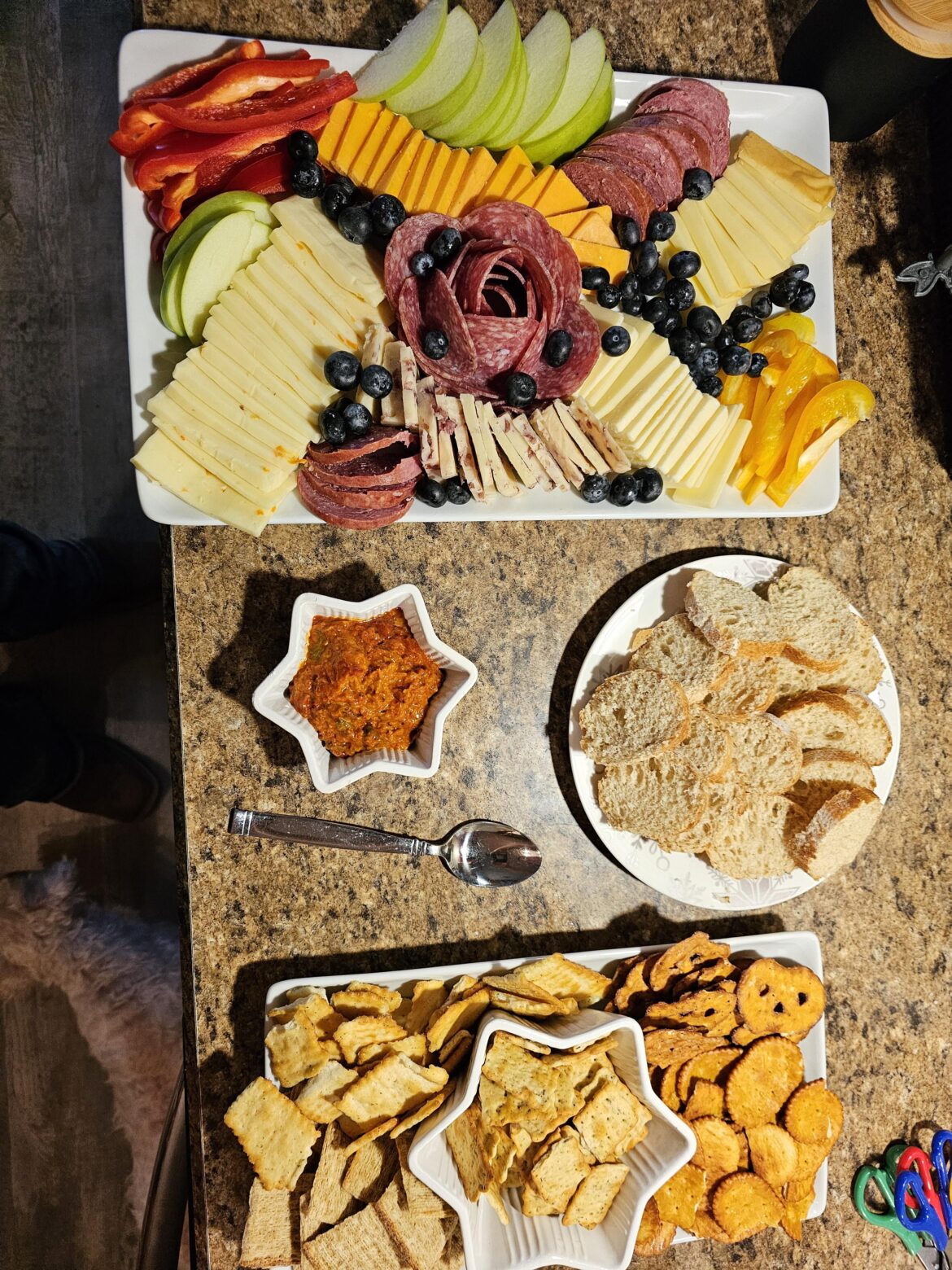 Dogs waiting patiently for a morseling of this spread