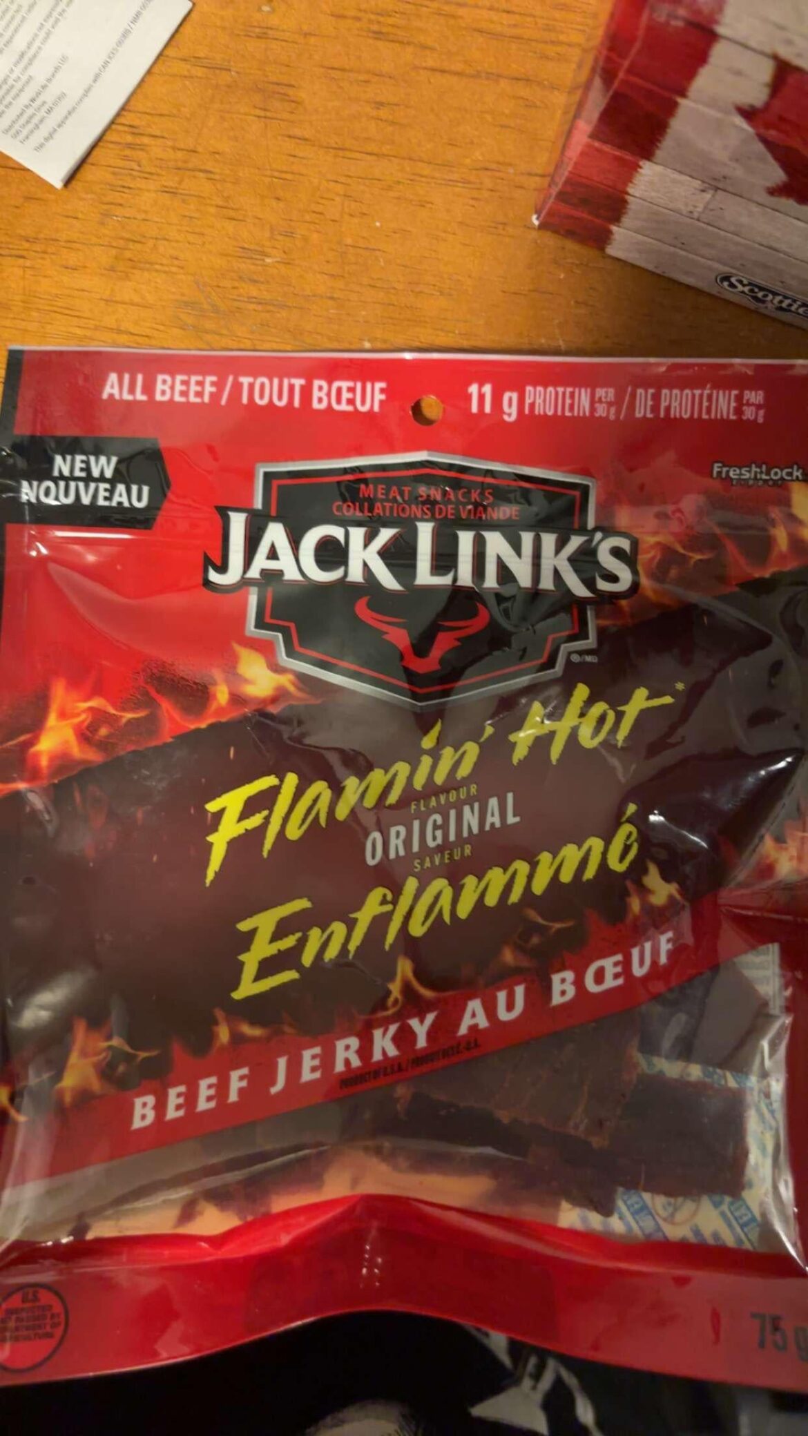 About to watch my FAVOURITE Jim Carrey movie The Mask & try this Flaming Hot beef jerky