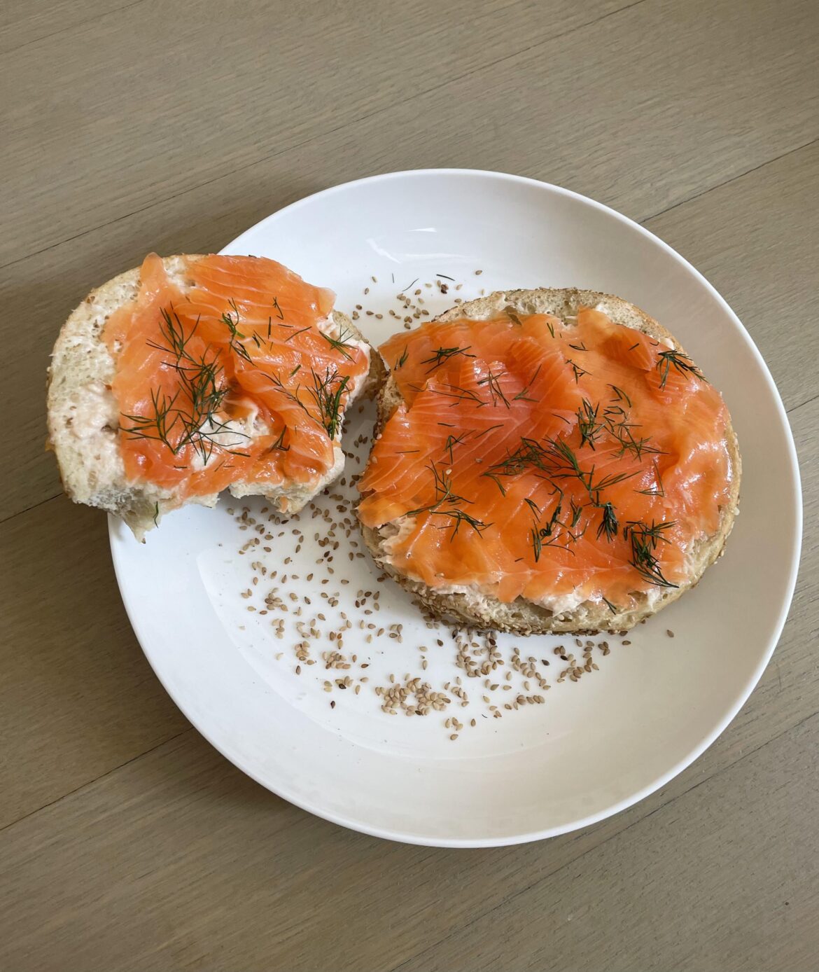 Open-faced sandwich: sesame bagel with whitefish and lox