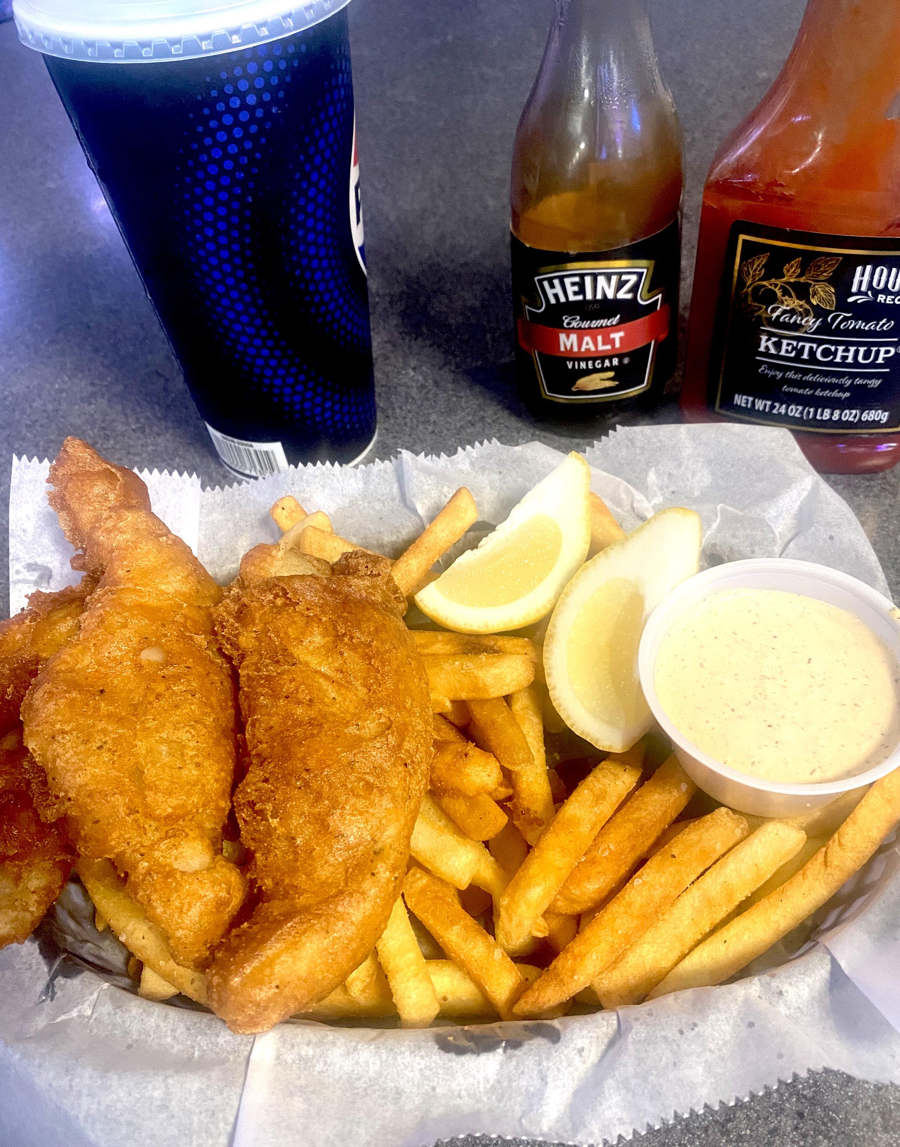 [I ate] fish and chips with house made tartar sauce on the fries, and