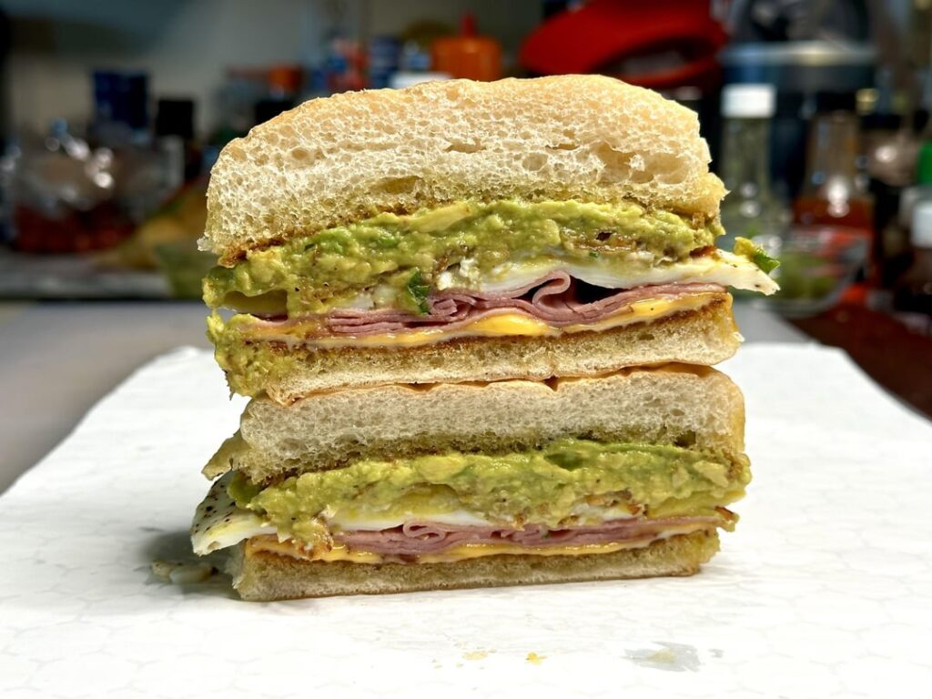 Ham, egg, cheese, and avocado breakfast sandwich!