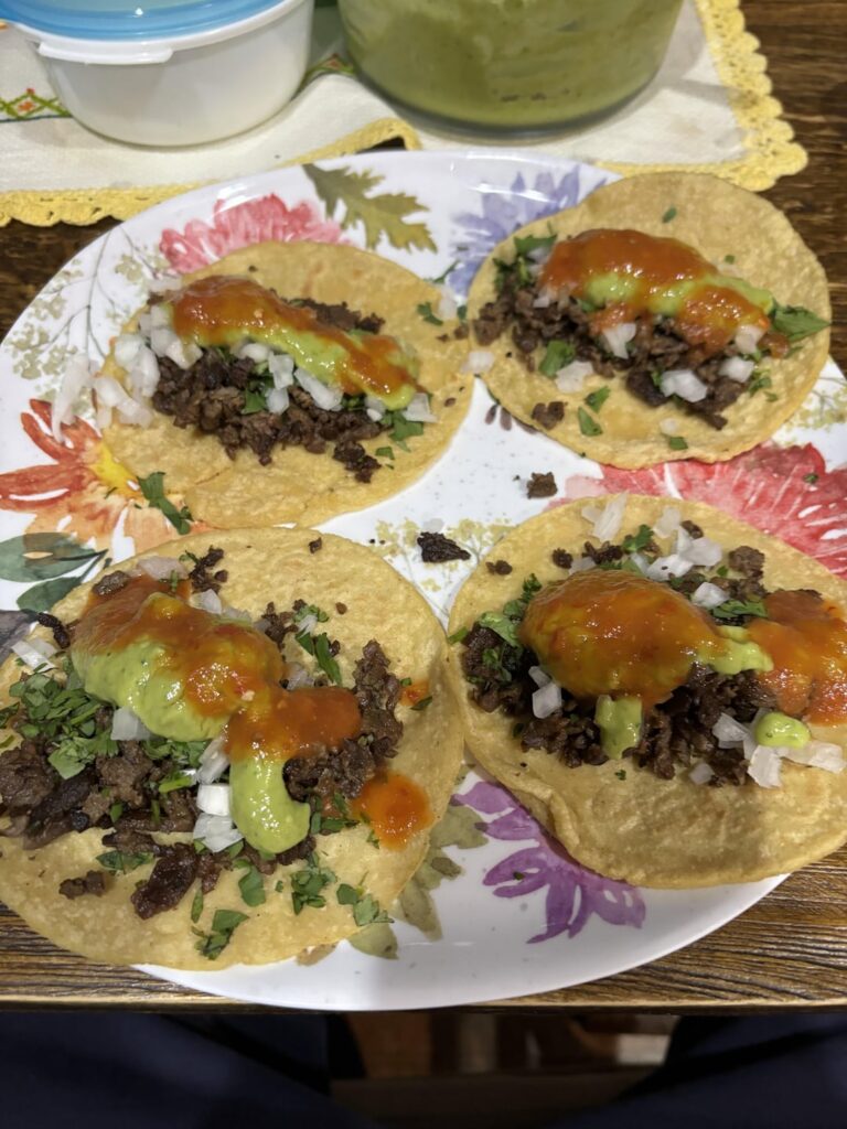 Homemade bistec tacos on homemade corn tortillas
