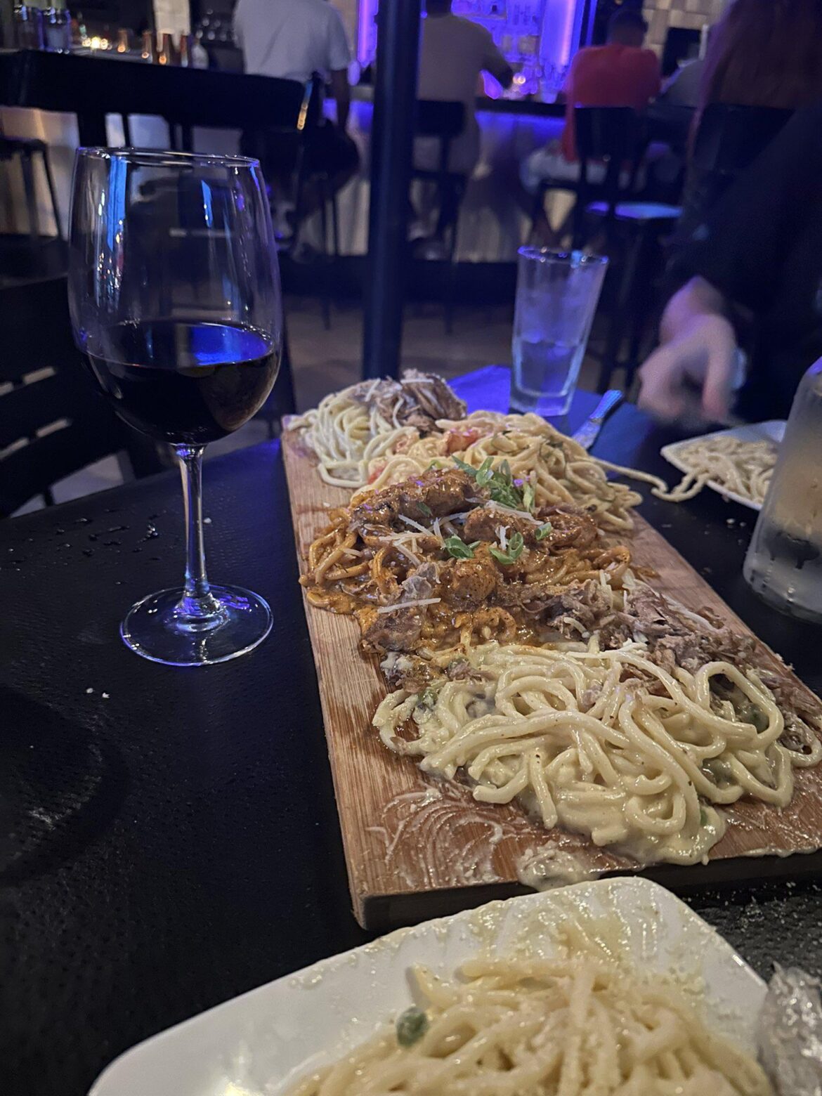 Pasta flight served on construction debris