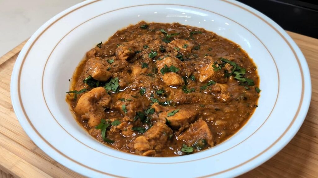 Chicken Dhansak, Succulent chicken in creamy red lentil curry.