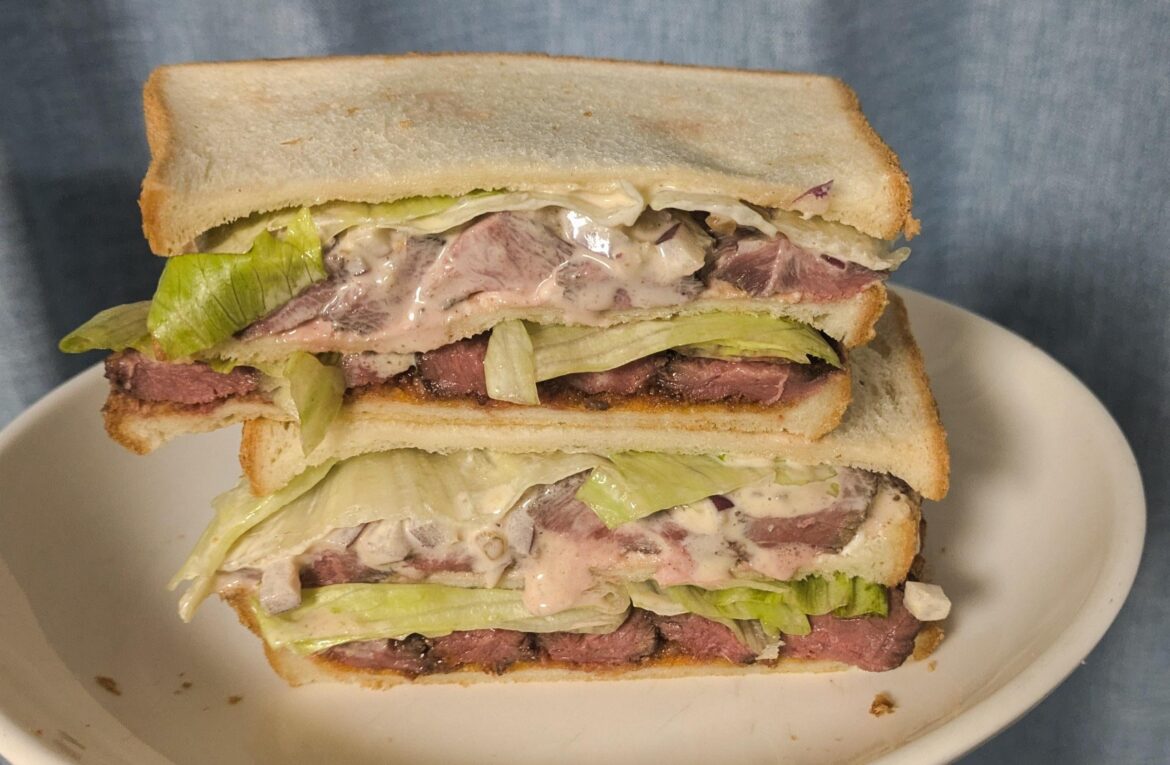 Venison steak sandwich with spicy bacon jam