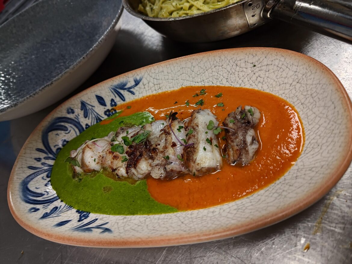 Kalamata marinated anglerfish, red prawn bisque and green curry