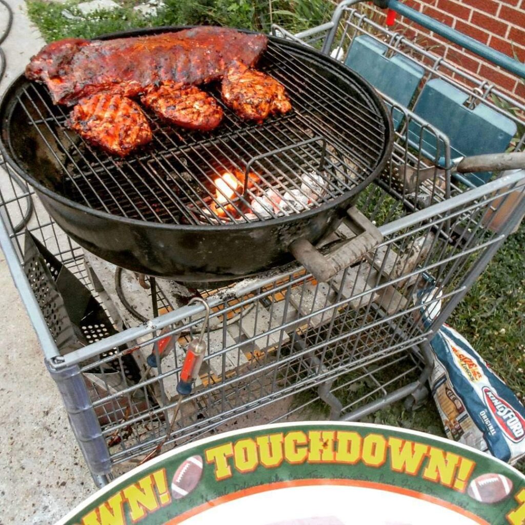 Happy 4th from the hood, You know a brother from da hood gots a grill in the shopping buggy, only way to roll. 4th of July Ribs n Chicken
