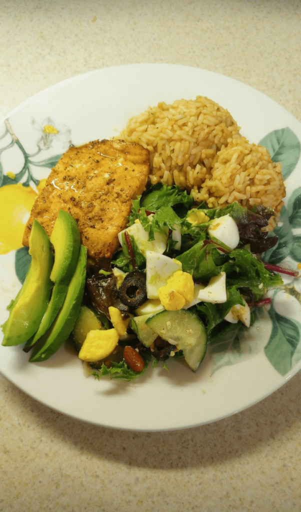 Broiled Salmon, Chicken Flavored Rice, Salad & Sliced Avocado Broiled Salmon, Chicken Flavored Rice, Salad & Sliced Avocado