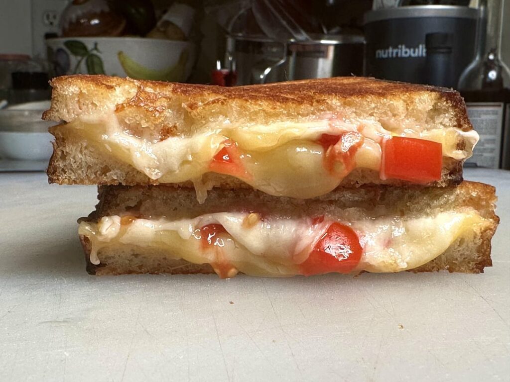 Simple grilled cheese and tomato melt