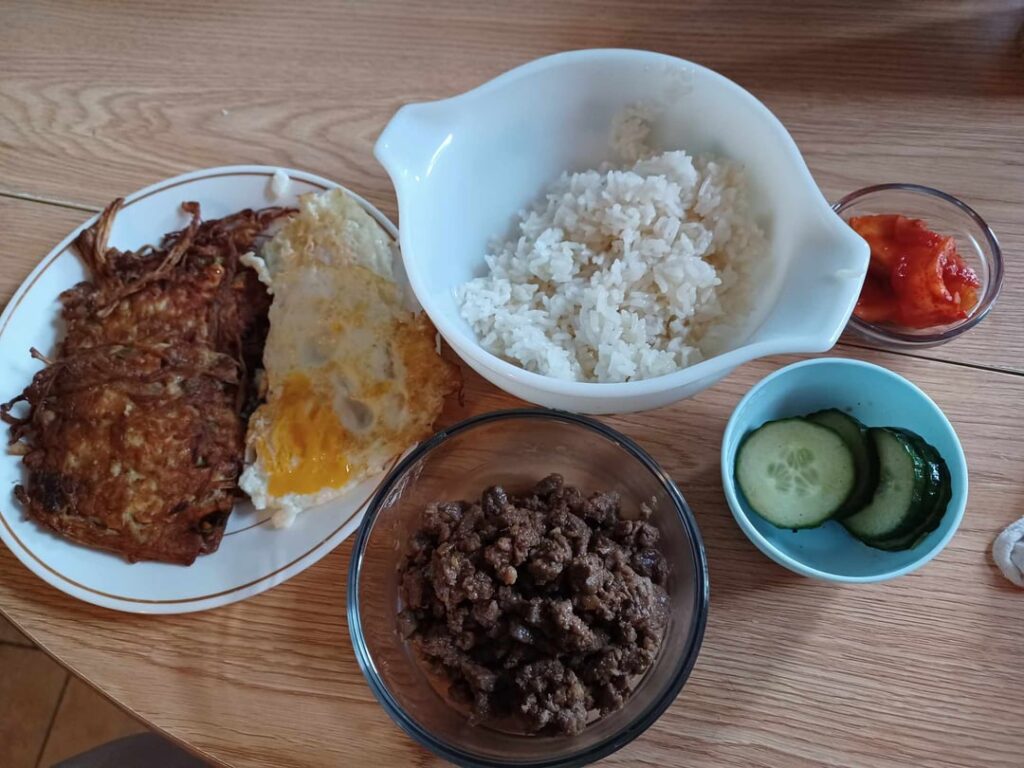 Dinner tonight ! Bulgogi, enochi pancakes, watermelon rind kimchi, rice and oi muchim, and eggs.