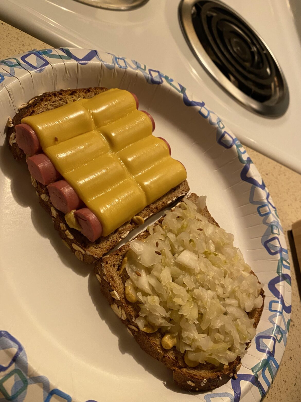I had a vision I had to act upon. Vienna sausage, American cheese and sauerkraut w/ spicy brown mustard on Dave’s sprouted bread.
