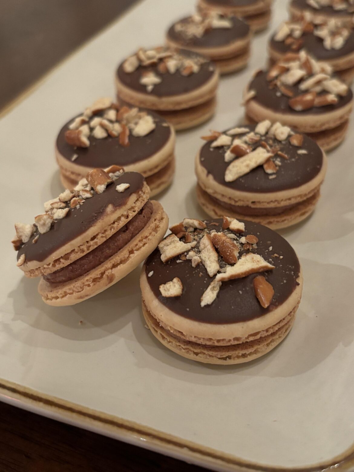 Chocolate covered pretzel macarons for my friend’s birthday!