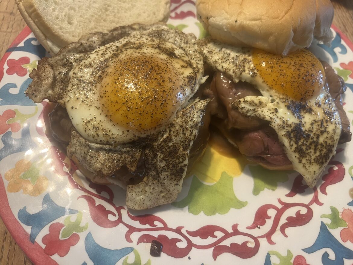 Hot roast beef and gravy on an onion roll.