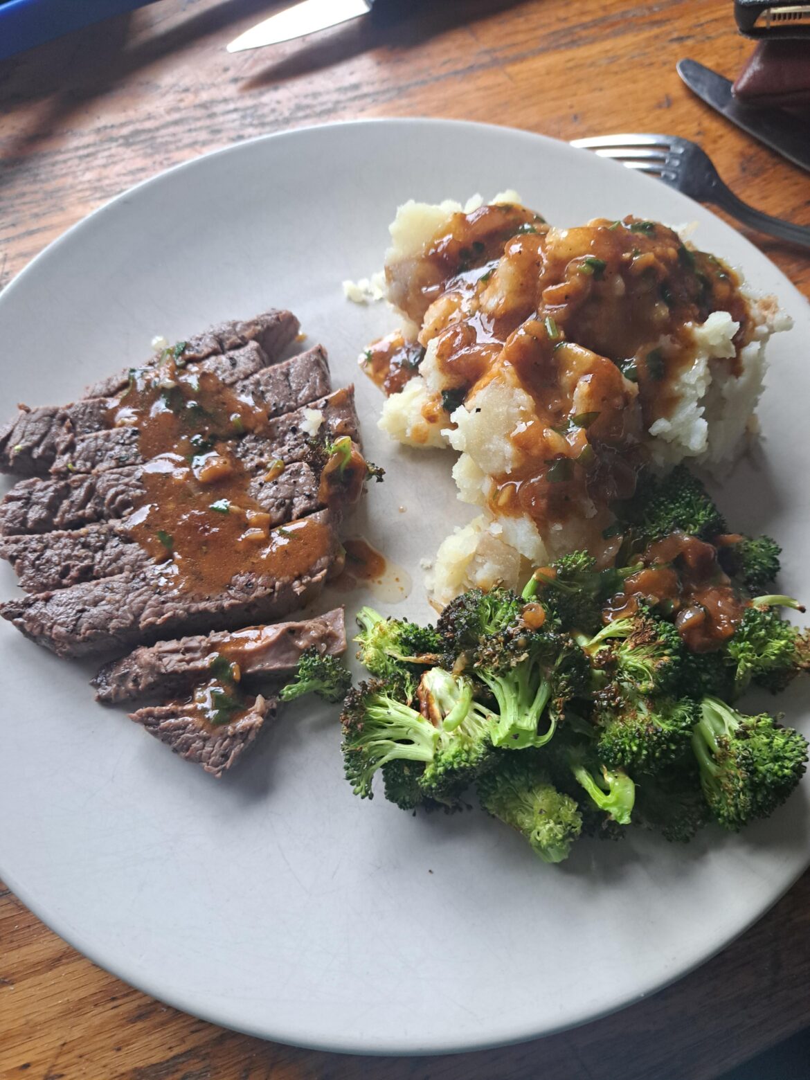 Beef rump, broccoli, mashed potato with garlic parsley butter.